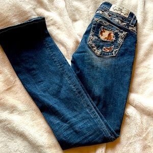Miss Me Jeans! Size 26! Cow patterning on back pockets!